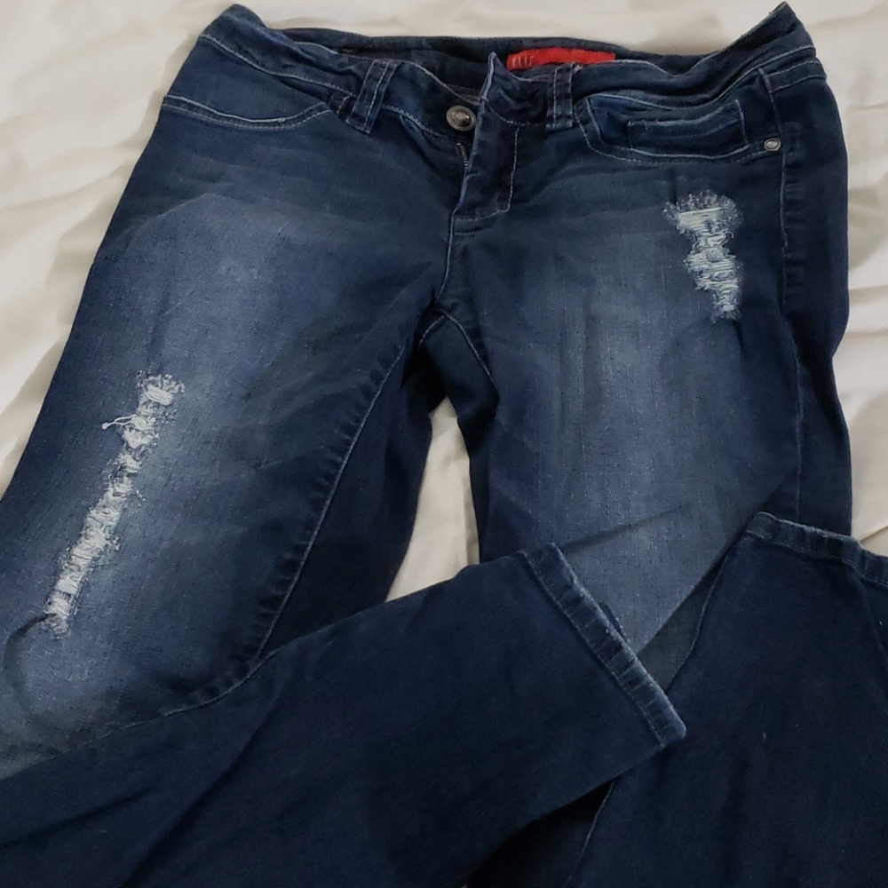 Dark skinny distressed Jean's